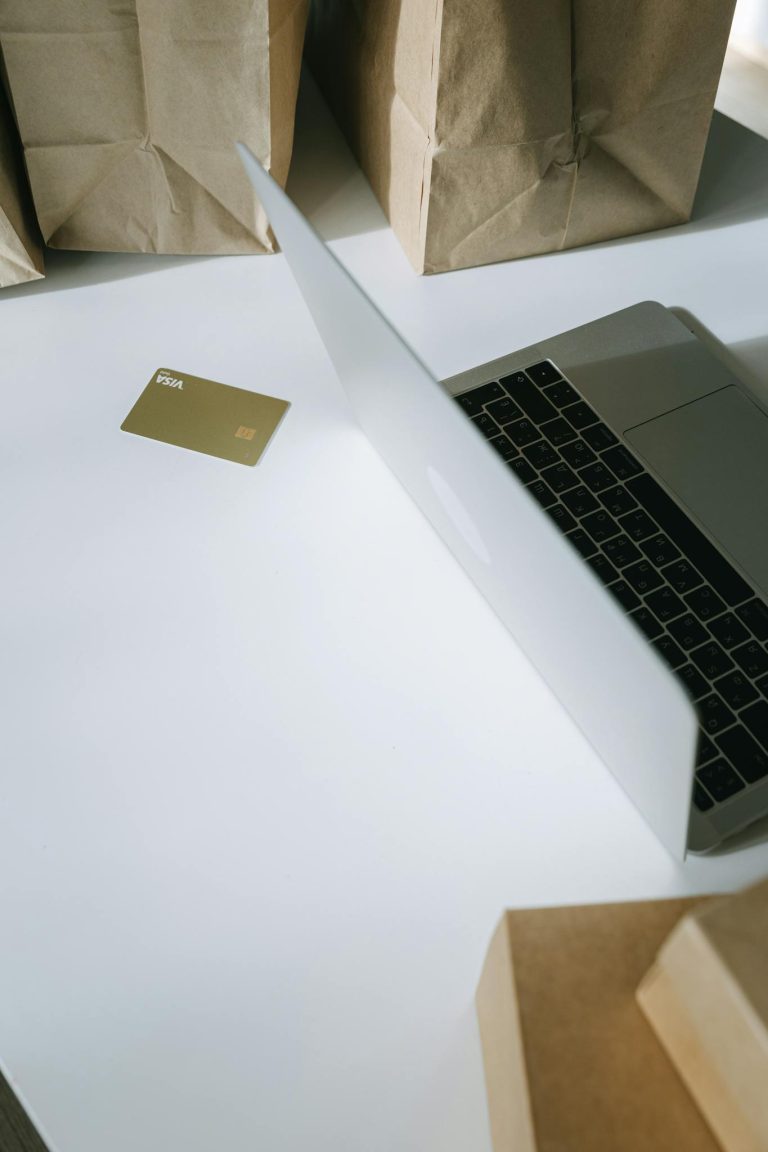 Macbook Pro on White Table